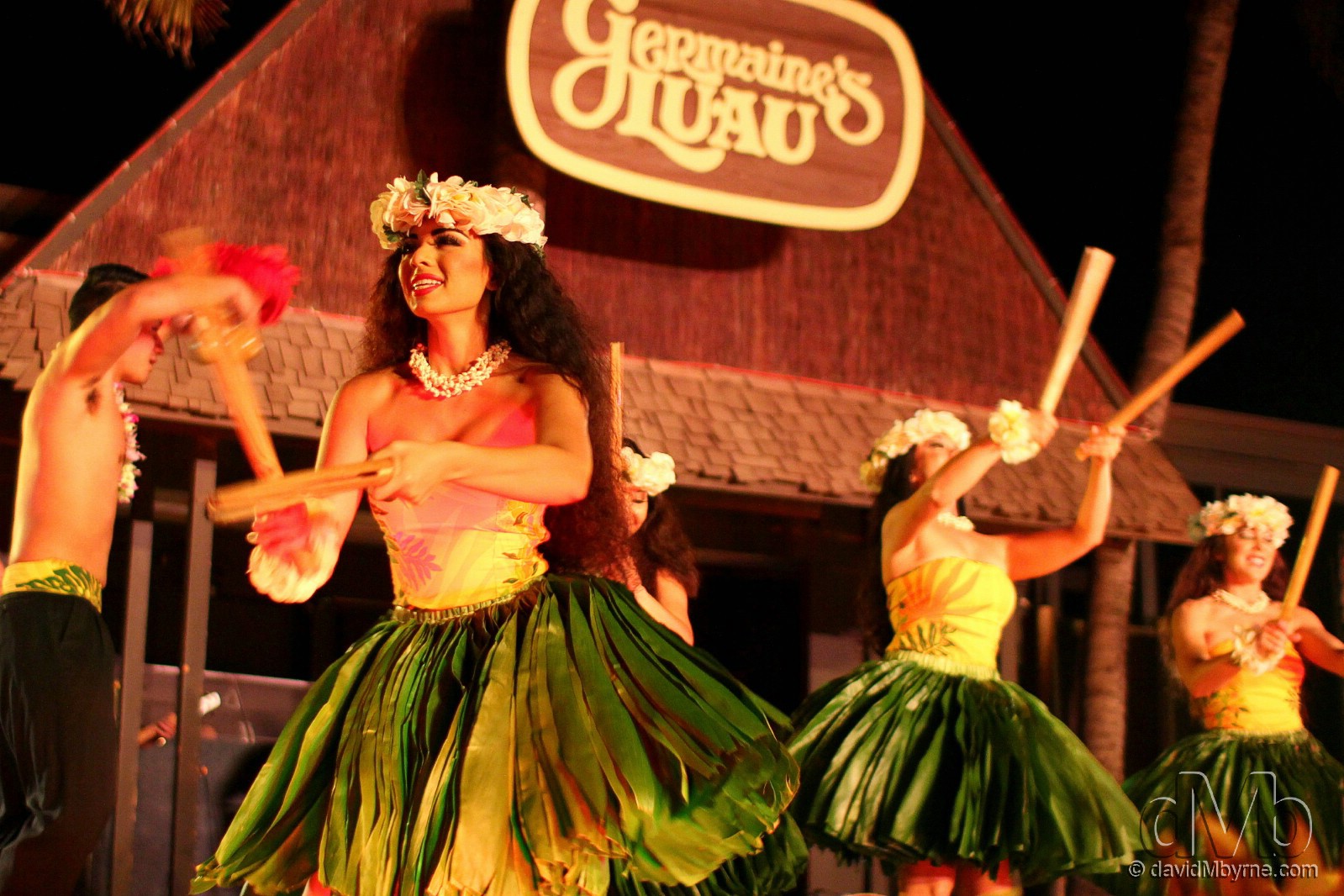 Kane (men) & wahine (women) dancers at Germaine’s Luau, Oahu, Hawaii, USA. February 27th 2013 (EOS 60D || Sigma 30mm f/1.4 || 30mm, 1/100sec, f/1.4, iso1250)