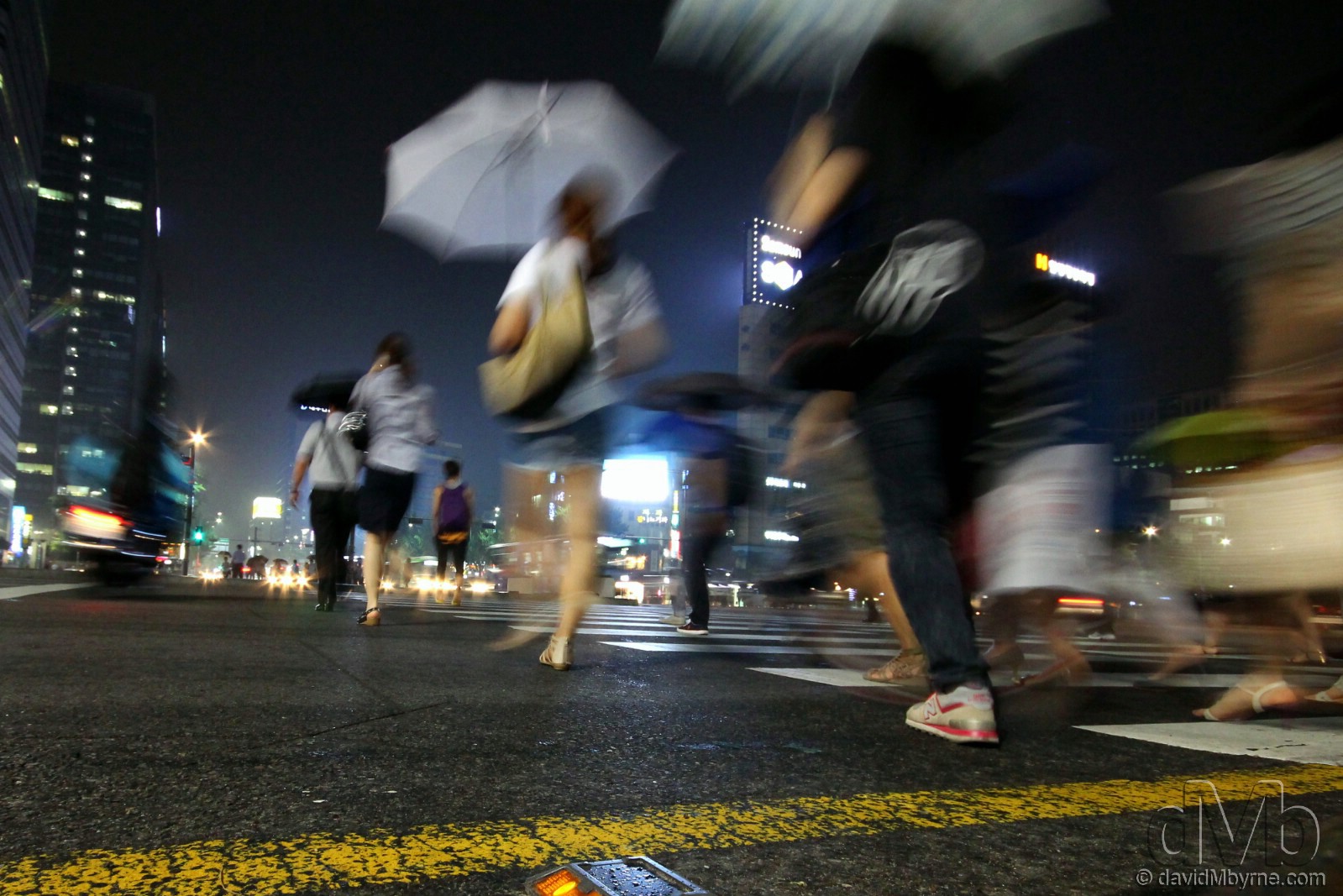 Crossing the road in Jongno, Seoul, South Korea. July 12th, 2012 (EOS 60D || Sigma 10-20mm || 10mm, 1/4sec, f/9.0, iso1600)