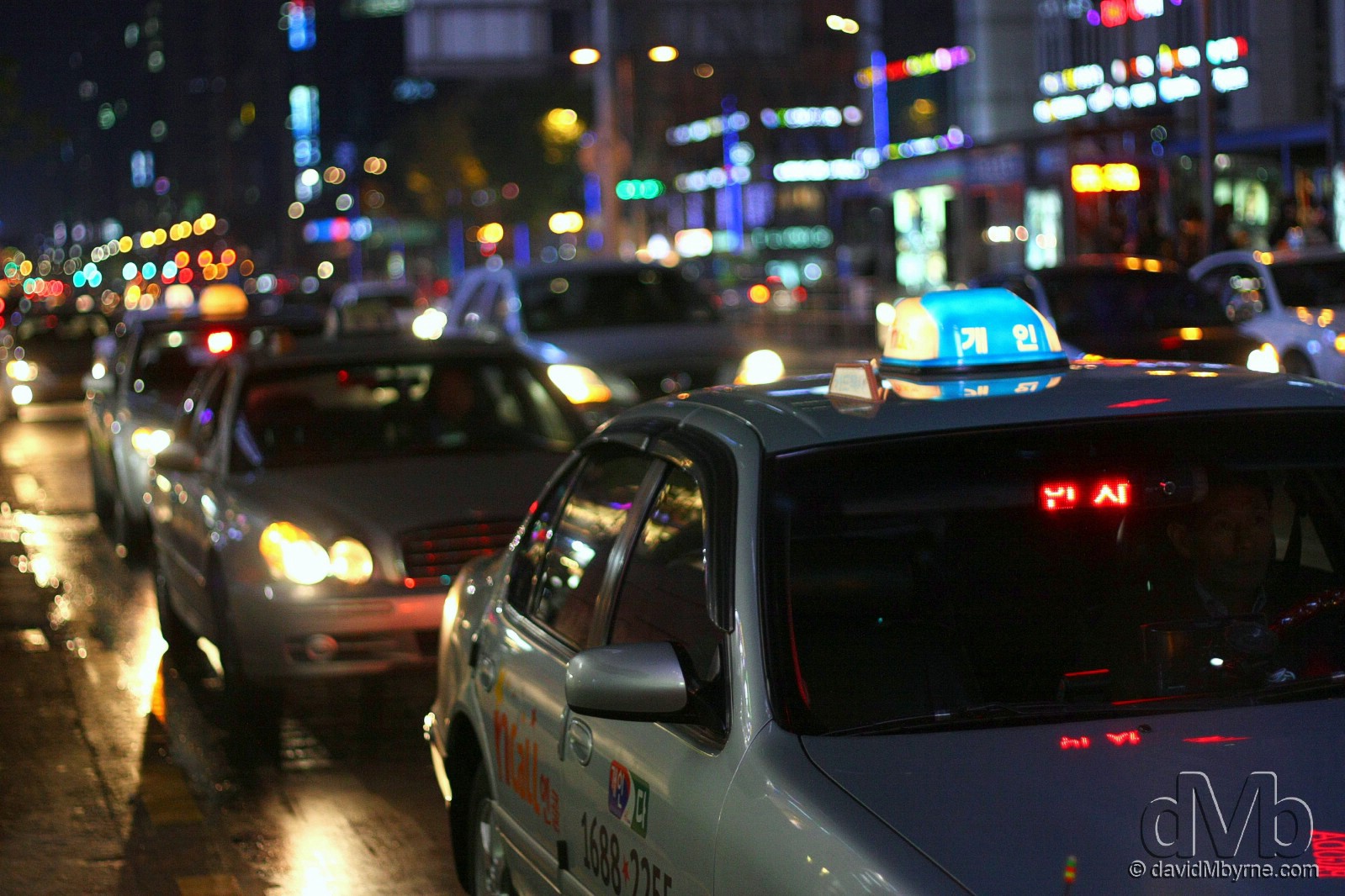 Taxis on the streets of Gangnam, Seoul, South Korea. November 18th, 2011 (50mm, 1/200sec, f/1.8, iso800)